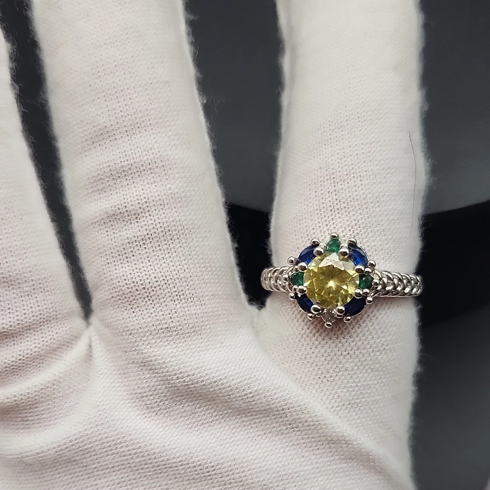 Elegant Silver Ring with Yellow and Blue Stones